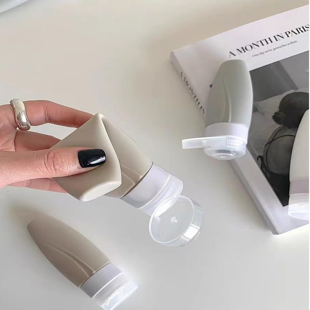 4 PCS Travel Squeeze Bottle, Leak Proof Silicon Tubes Travel Size Toiletries Containers,Travel Containers for Toiletries,