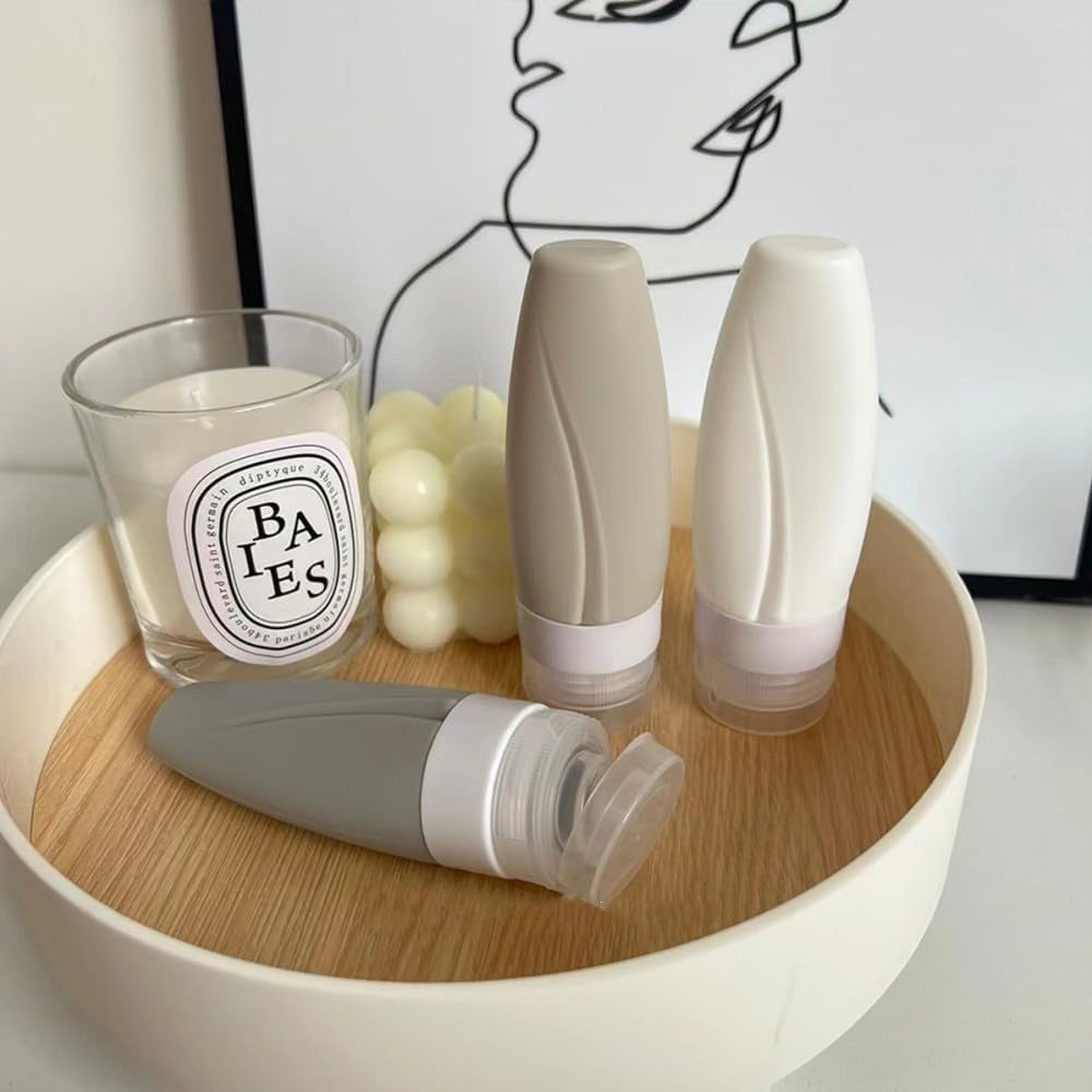 4 PCS Travel Squeeze Bottle, Leak Proof Silicon Tubes Travel Size Toiletries Containers,Travel Containers for Toiletries,